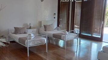 Quadruple Room | Premium bedding, minibar, in-room safe, desk