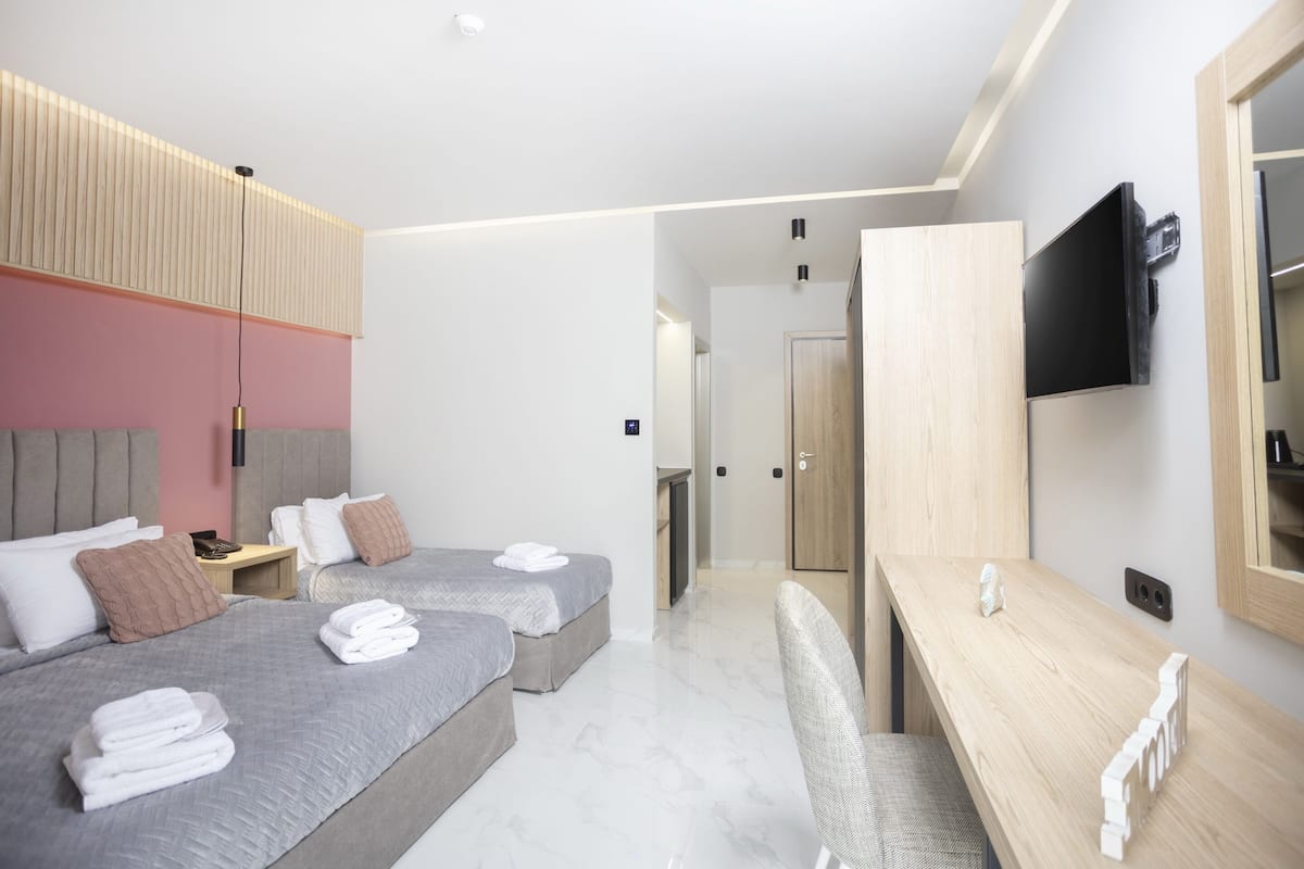 Roba de llit d'alta qualitat i caixa forta a l'habitació