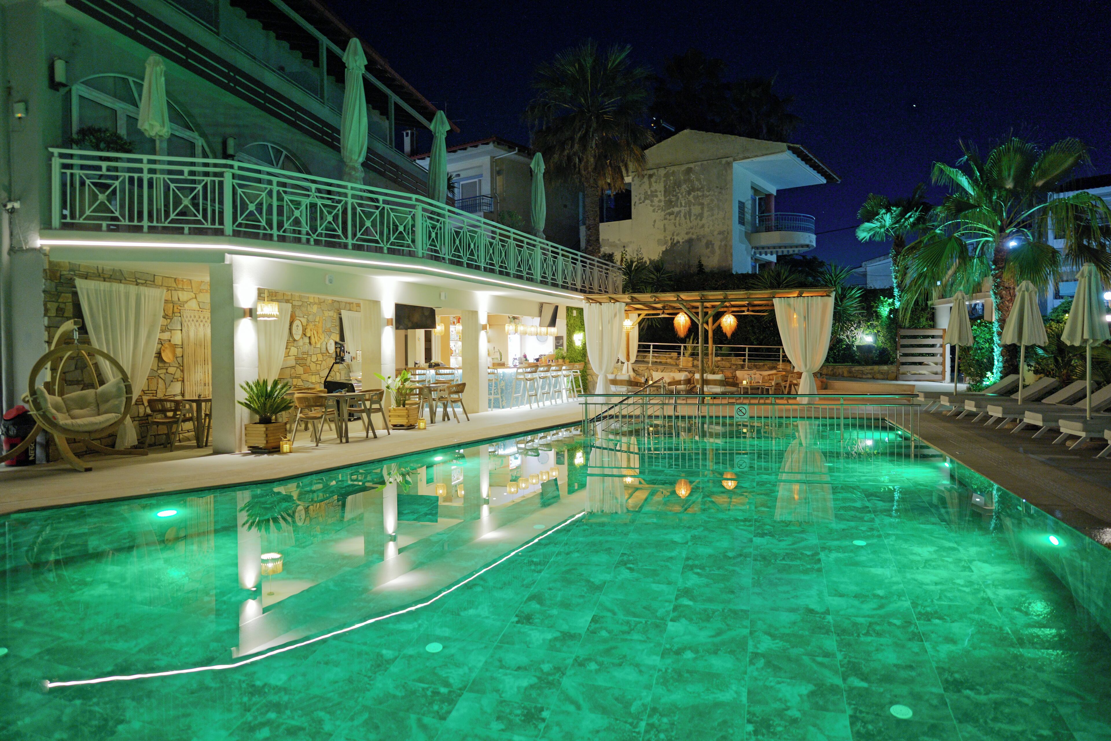Seasonal outdoor pool, pool umbrellas, pool loungers