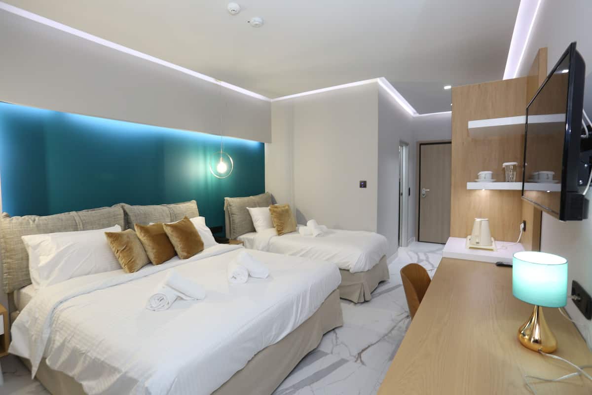 Roba de llit d'alta qualitat i caixa forta a l'habitació