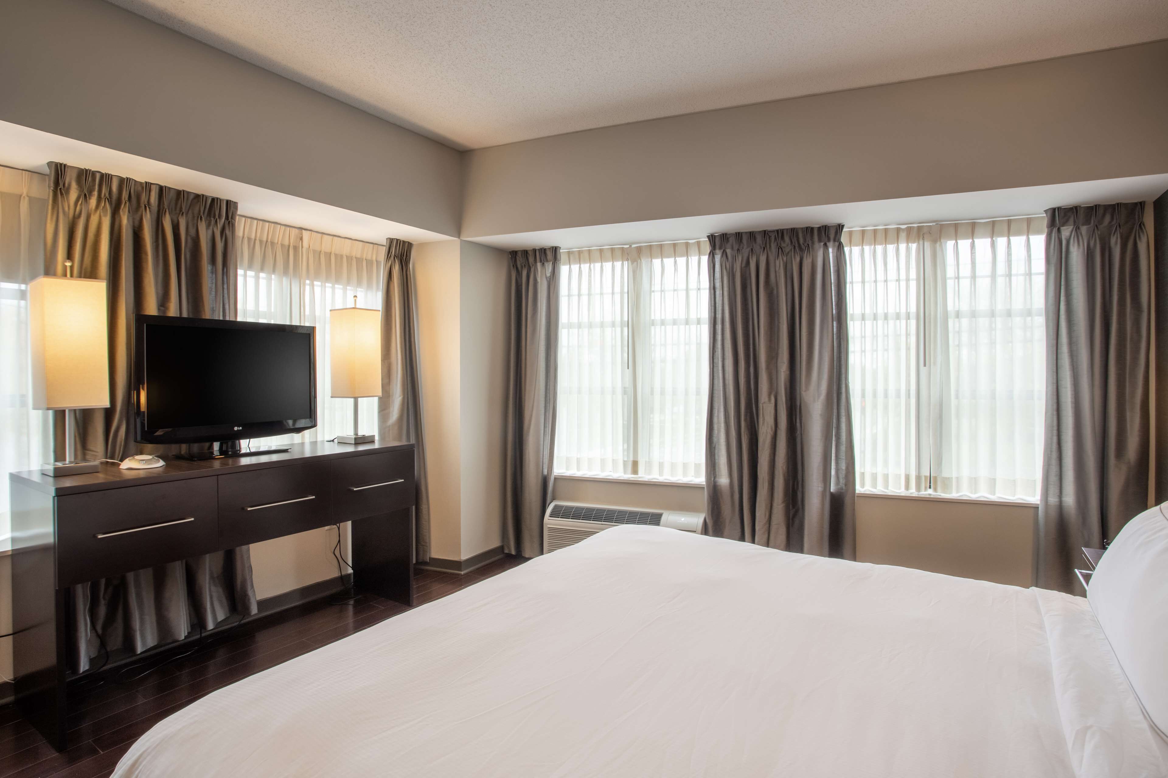 room, 1 king bed, corner (ellicott) | premium bedding, pillow-top beds, in-room safe, desk