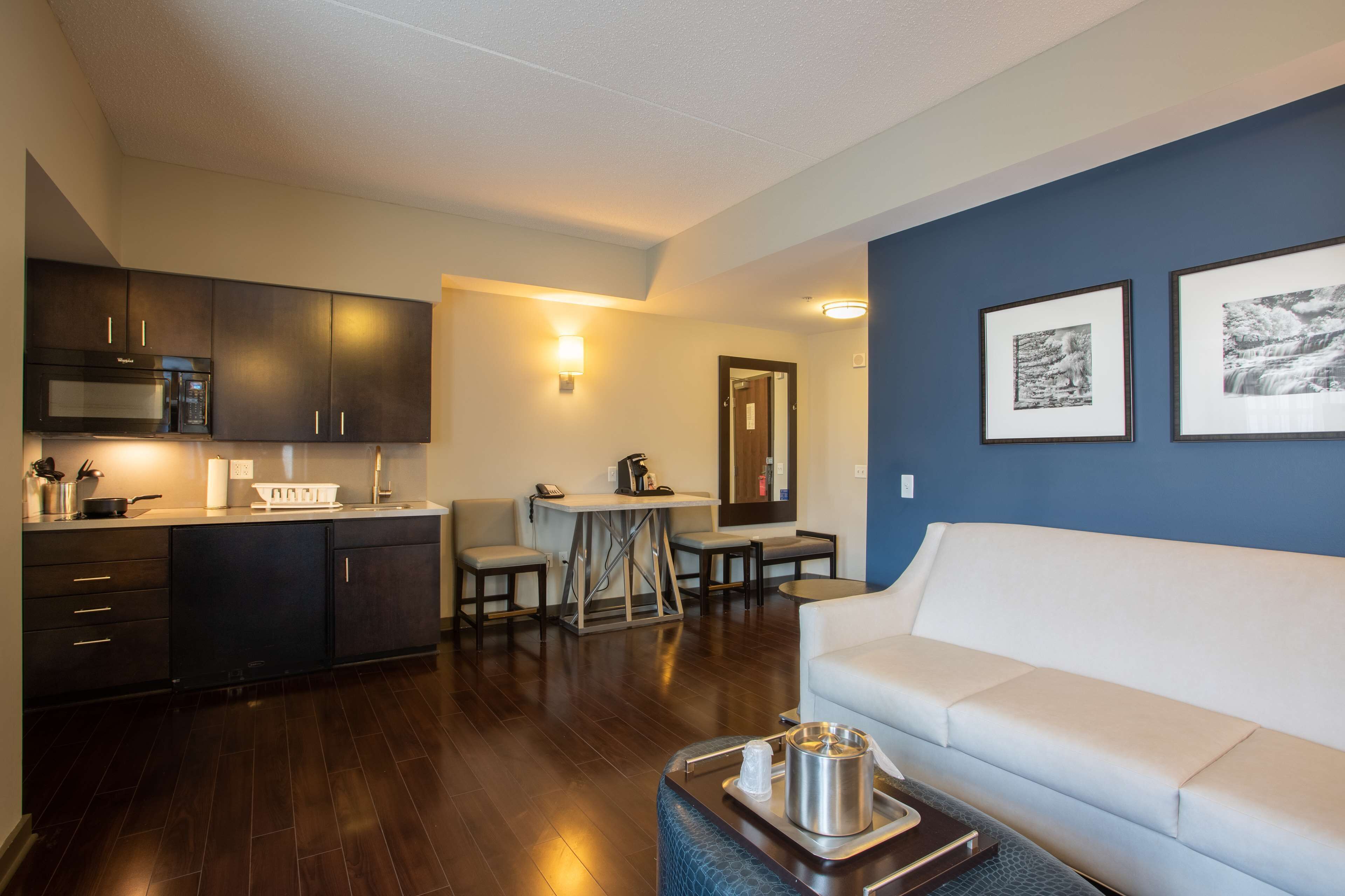 suite, 2 queen beds, non smoking (williams) | living area | 55-inch flat-screen tv with cable channels, tv, ipod dock