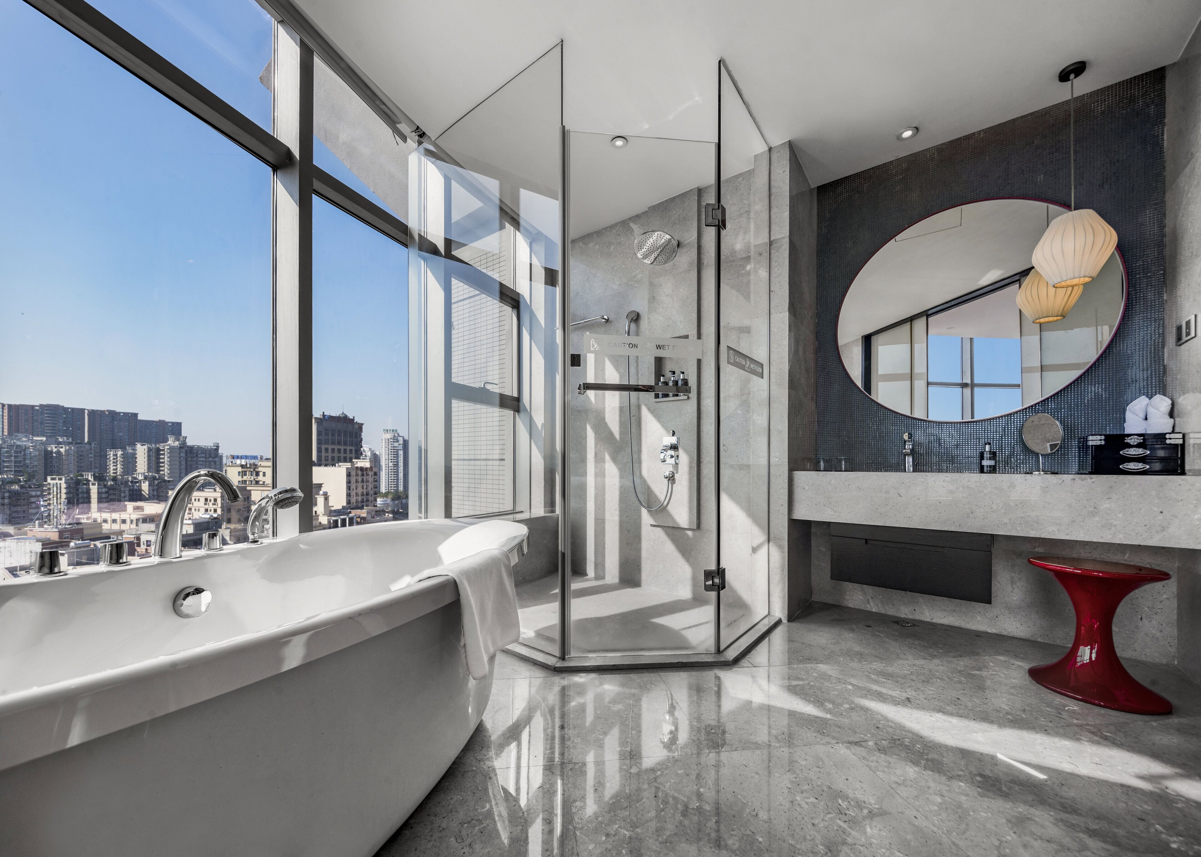 deluxe suite | bathroom | designer toiletries, hair dryer, bathrobes, slippers