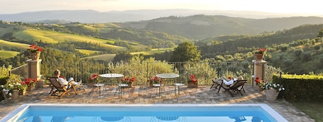 Outdoor pool, a rooftop pool, pool loungers. Wine Resort La Ghirlanda