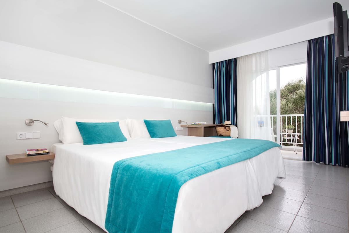 Blackout drapes, iron/ironing board (on request), rollaway beds (free)