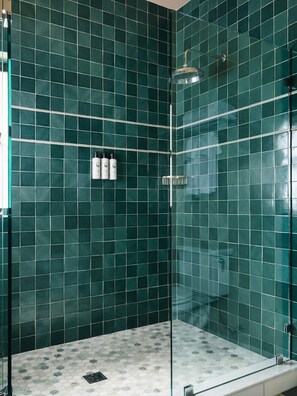 Designer toiletries, hair dryer, bathrobes, towels