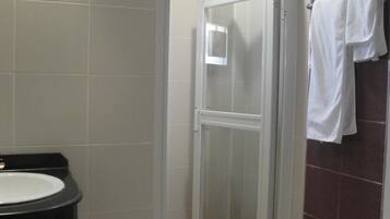 Shower, free toiletries, hair dryer, slippers