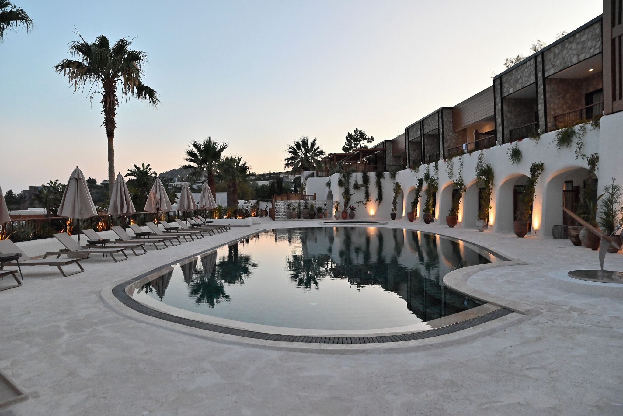 outdoor pool, pool umbrellas, pool loungers