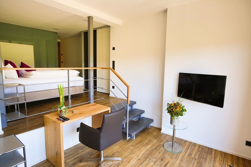 junior suite | hypo-allergenic bedding, desk, blackout curtains, cots/infant beds