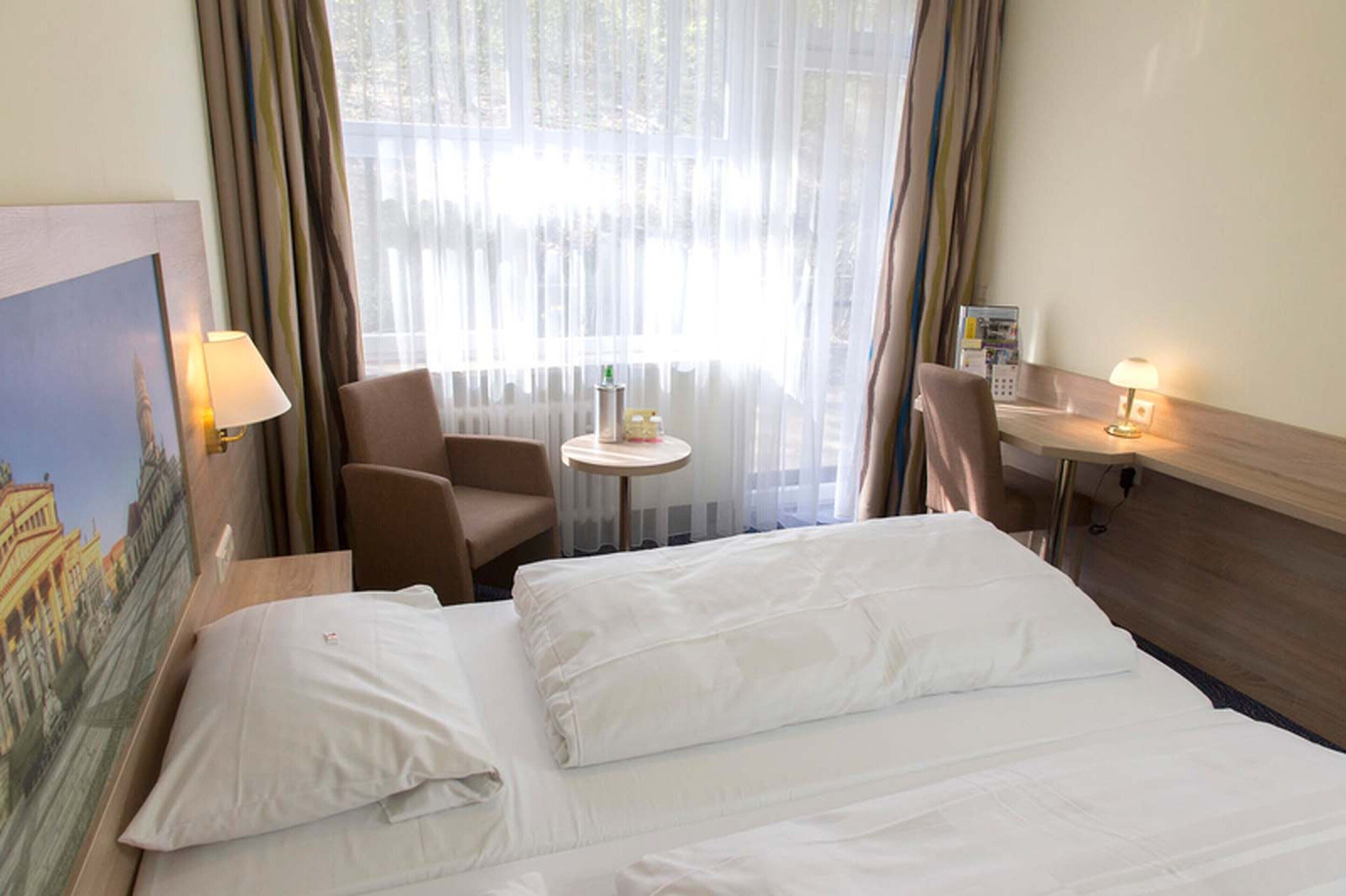 double room, lakeside | in-room safe, desk, laptop workspace, blackout curtains