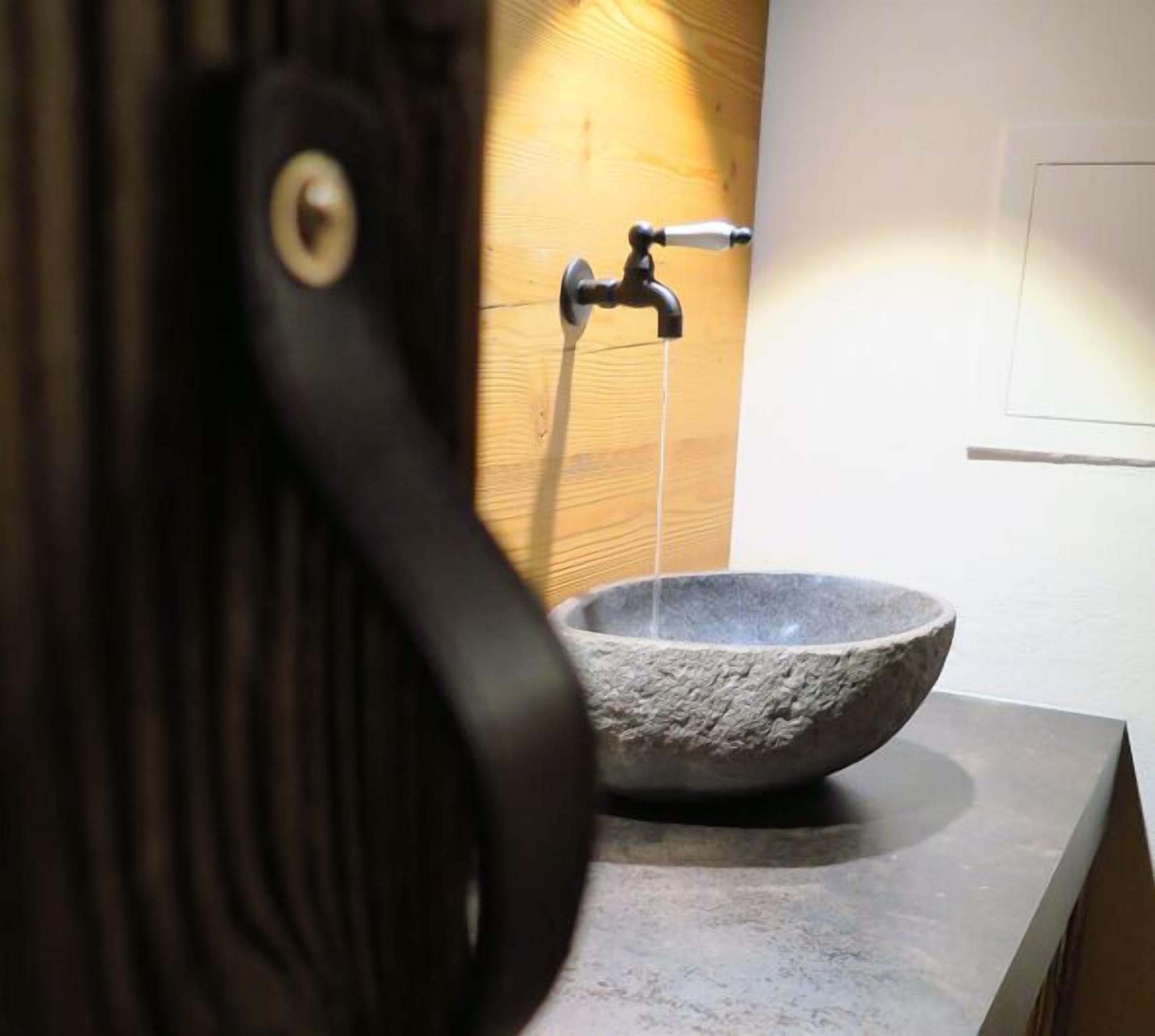 premium double room, fireplace, lake view | living area | flat-screen tv