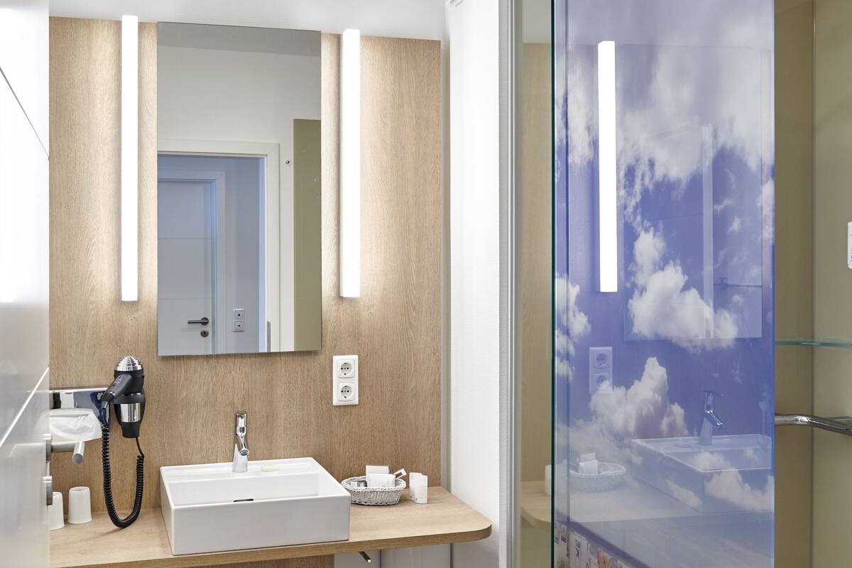 suite | bathroom | shower, hair dryer, bathrobes, slippers