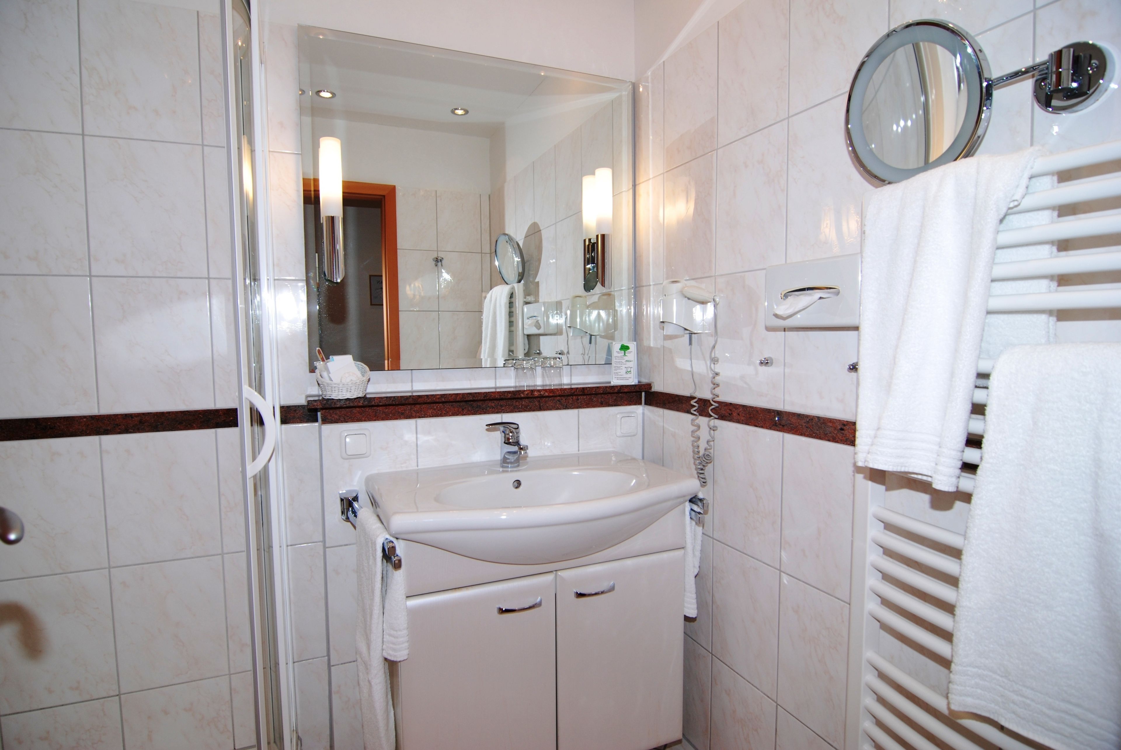 double room, lake view | bathroom amenities | shower, hair dryer, bathrobes, slippers