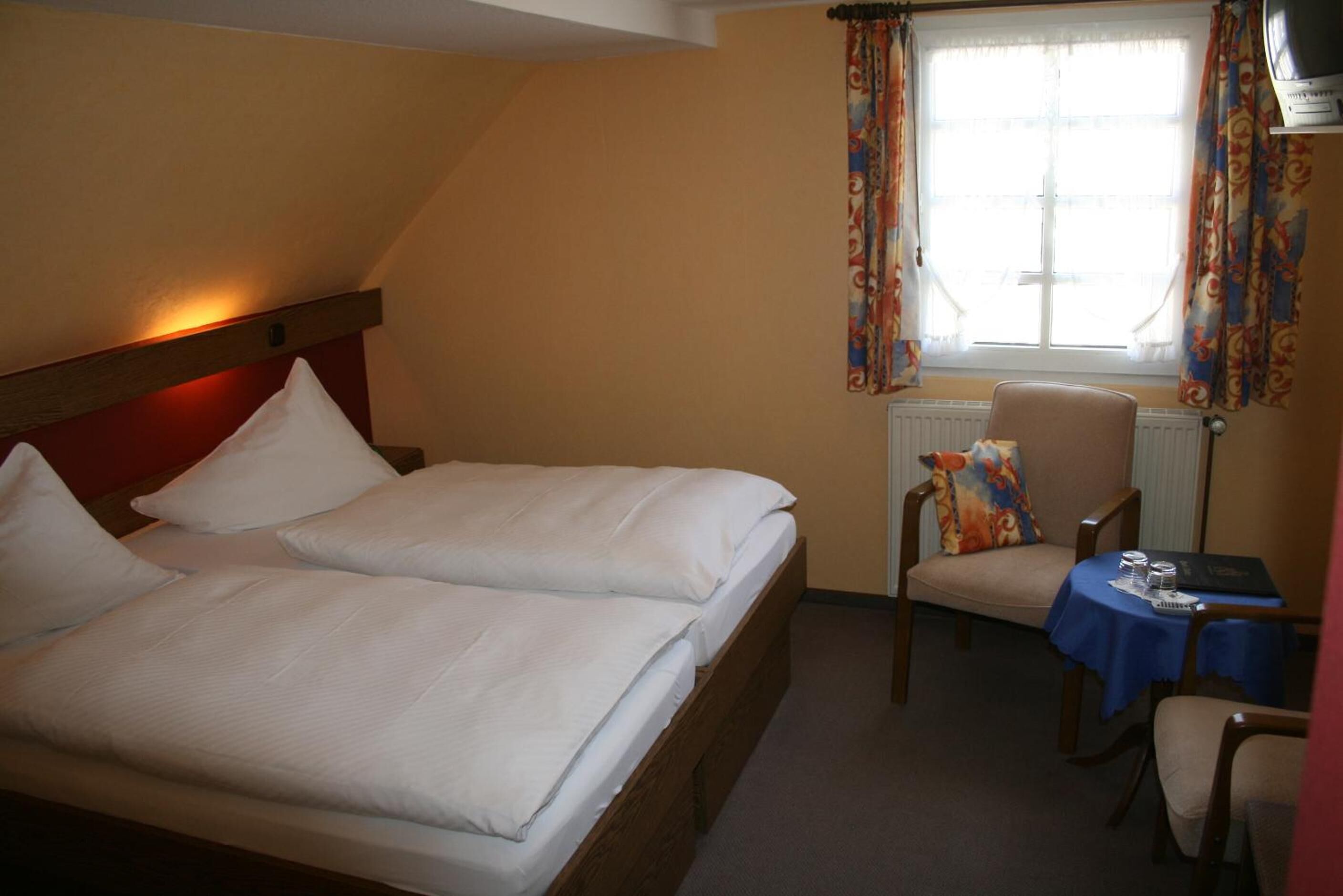 hypo-allergenic bedding, down duvets, in-room safe, desk