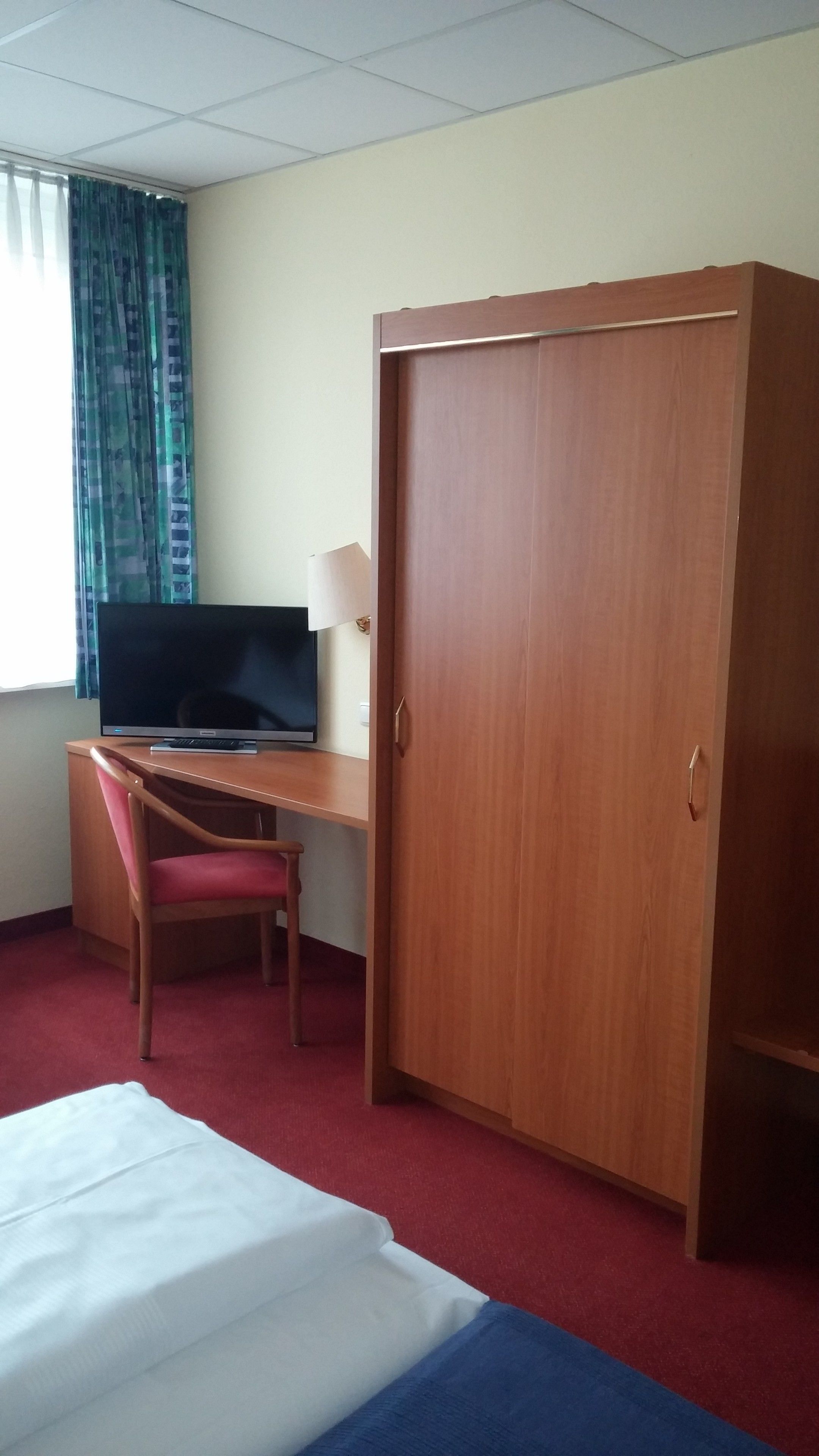 single room | in-room safe, desk, iron/ironing board, rollaway beds