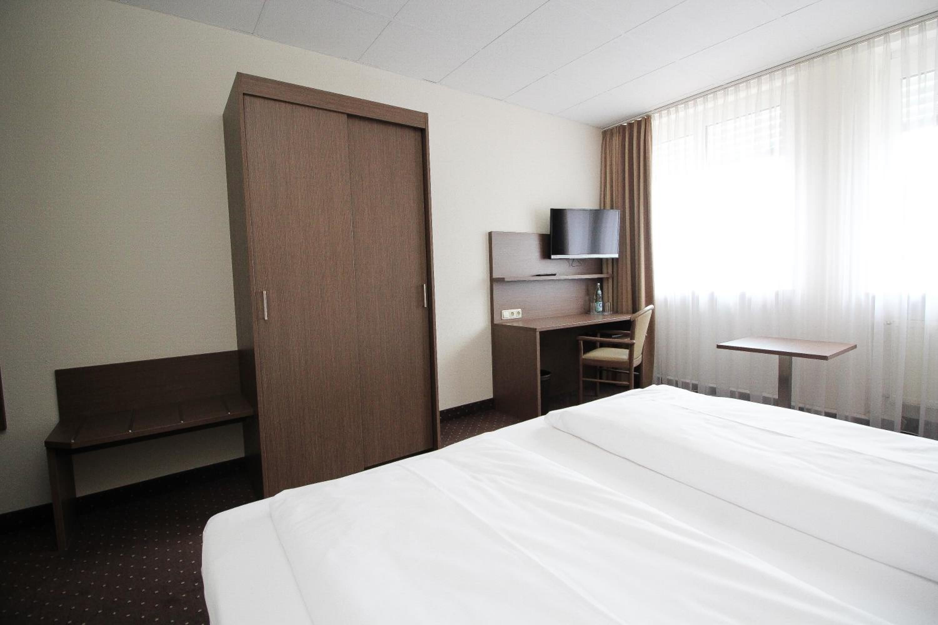 in-room safe, desk, iron/ironing board, rollaway beds
