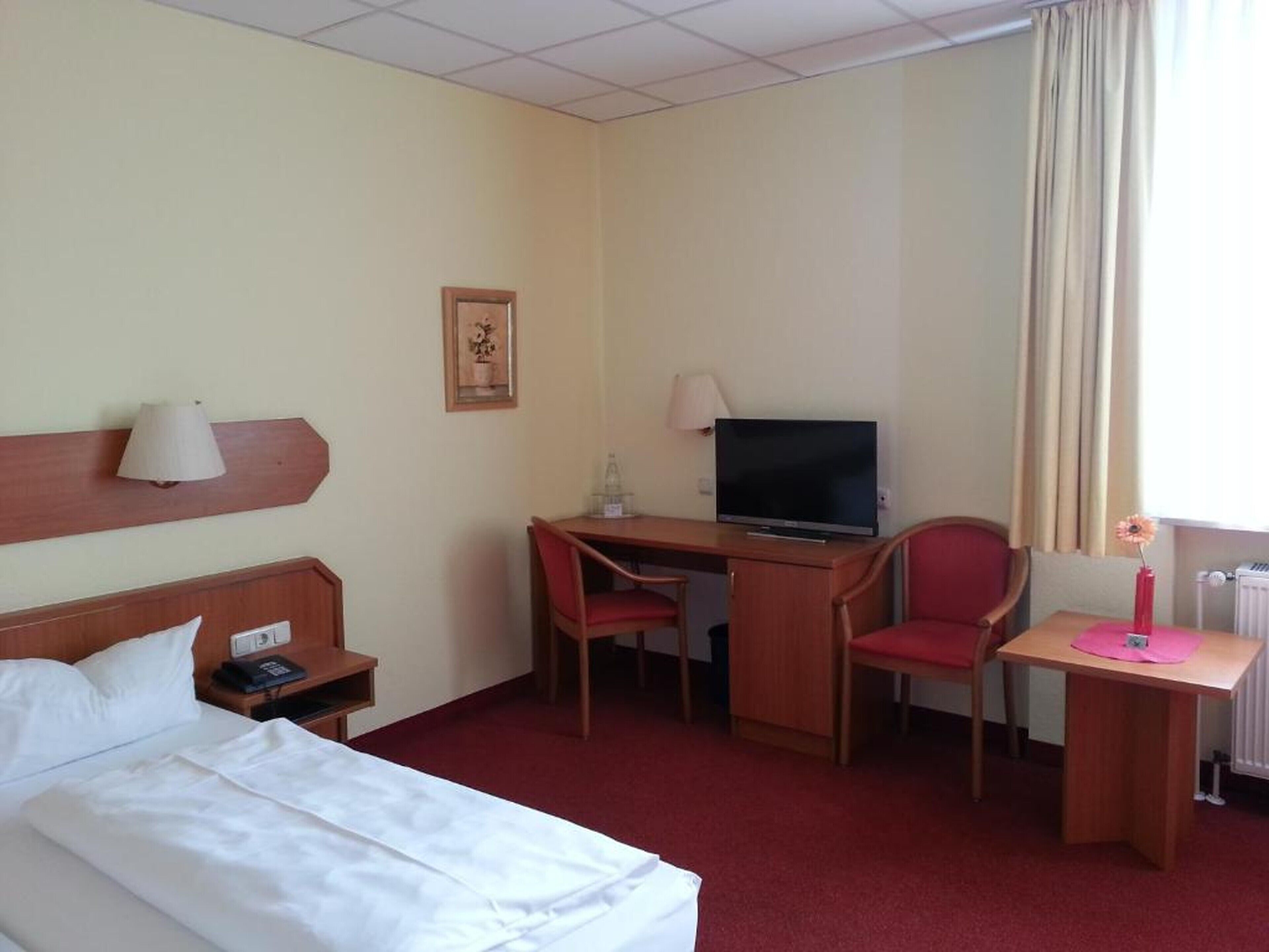single room | in-room safe, desk, iron/ironing board, rollaway beds