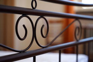 A close-up of a metal railing with a spiral design. - Hotel Gasthaus Schützen (Freiburg im Breisgau)