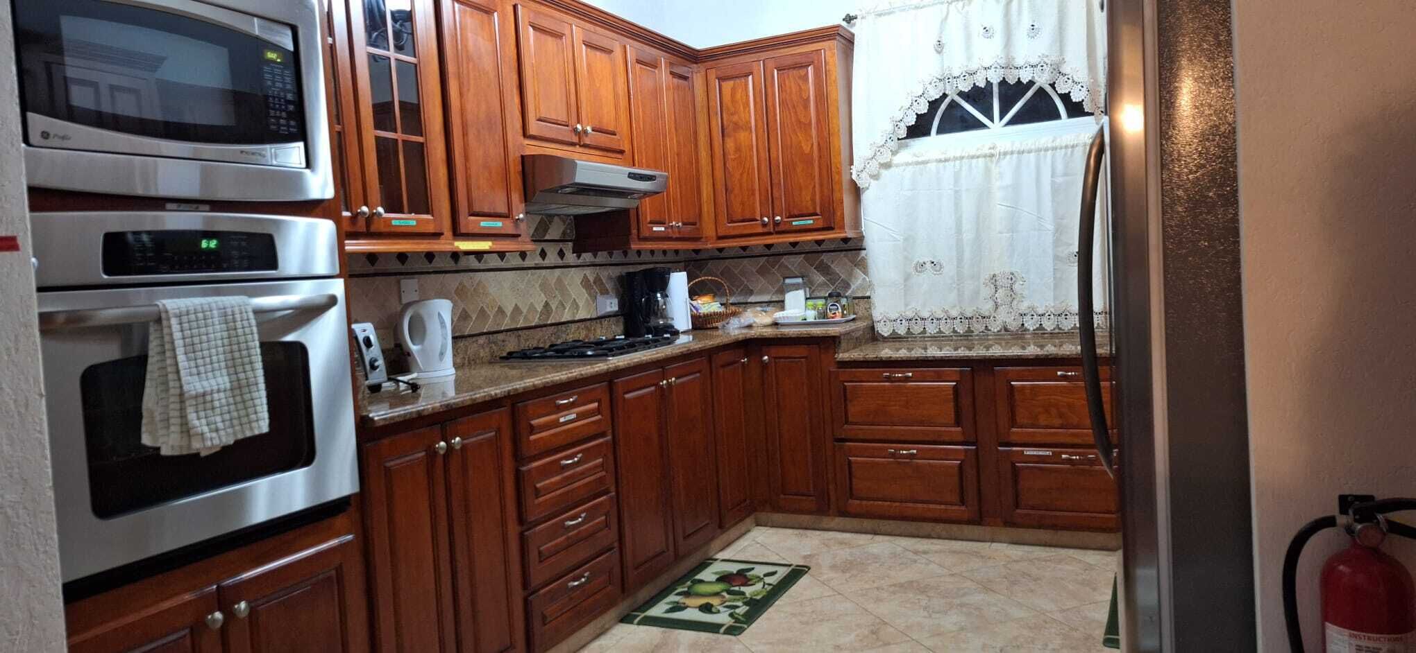 three bedroom ocean view villa | private kitchen | full-sized fridge, oven, stovetop, dishwasher