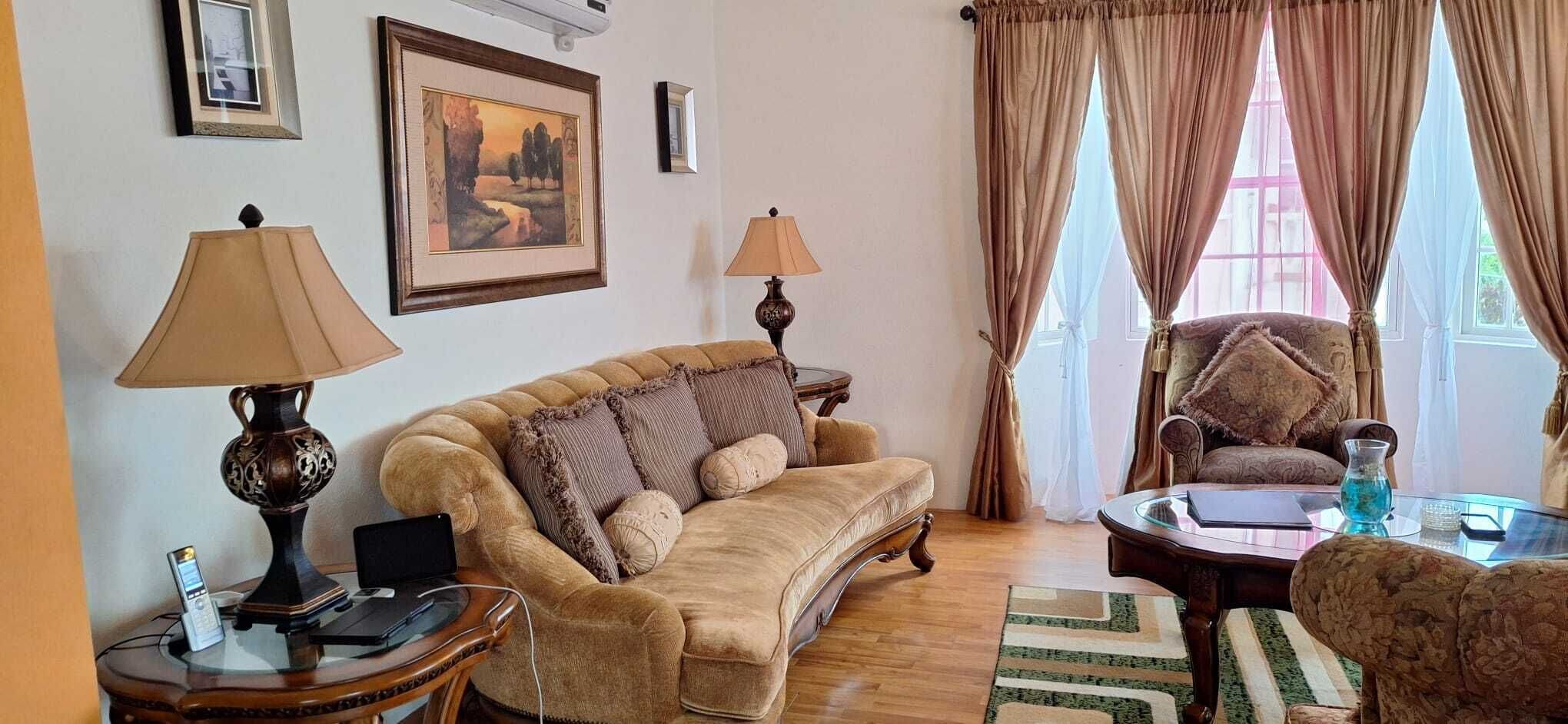 two bedroom garden view villa | living area | 50-inch led tv with cable channels, netflix, first-run films