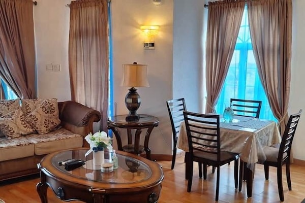 Three Bedroom Ocean View Villa | Living area | 50-inch LED TV with cable channels, Netflix, first-run movies