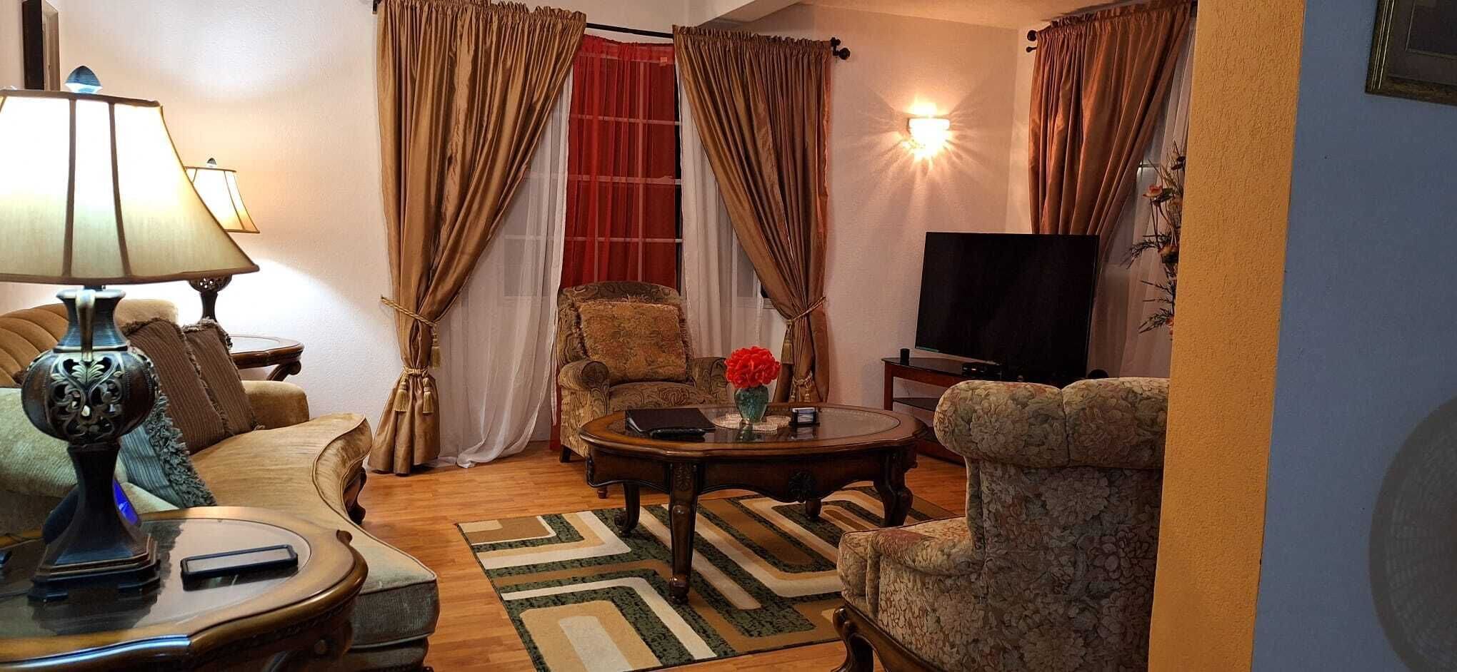 Two Bedroom Garden View Villa | Living area | 50-inch LED TV with cable channels, Netflix, first-run movies