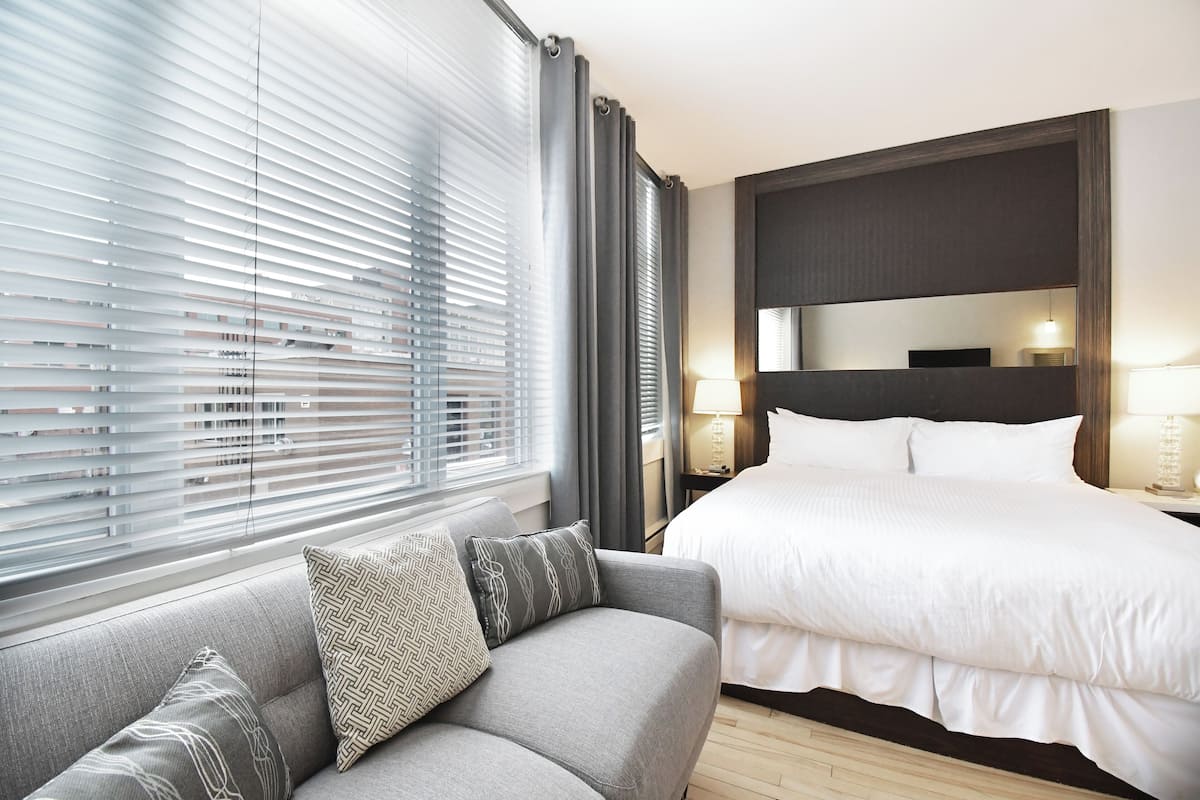 Suite junior, 1 cama King size, tina | Vista a la ciudad