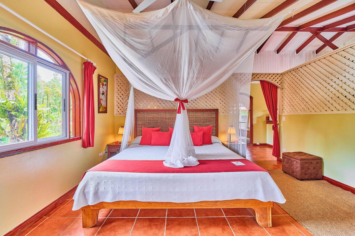 Deluxe Suite, 1 Bedroom, Partial Ocean View | Living area | 32-inch TV with cable channels