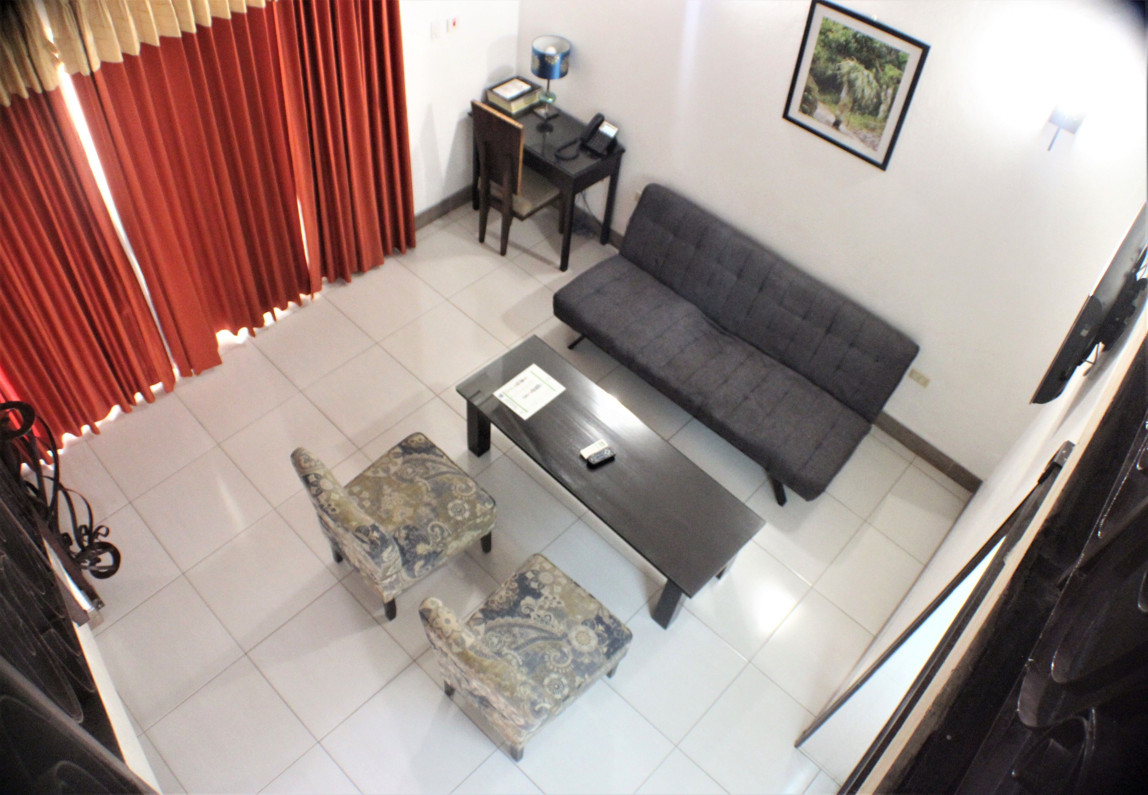 junior suite, non smoking | living area | flat-screen tv
