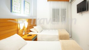 Quarto Standard Solteiro | Minibar, in-room safe, free WiFi, wheelchair access