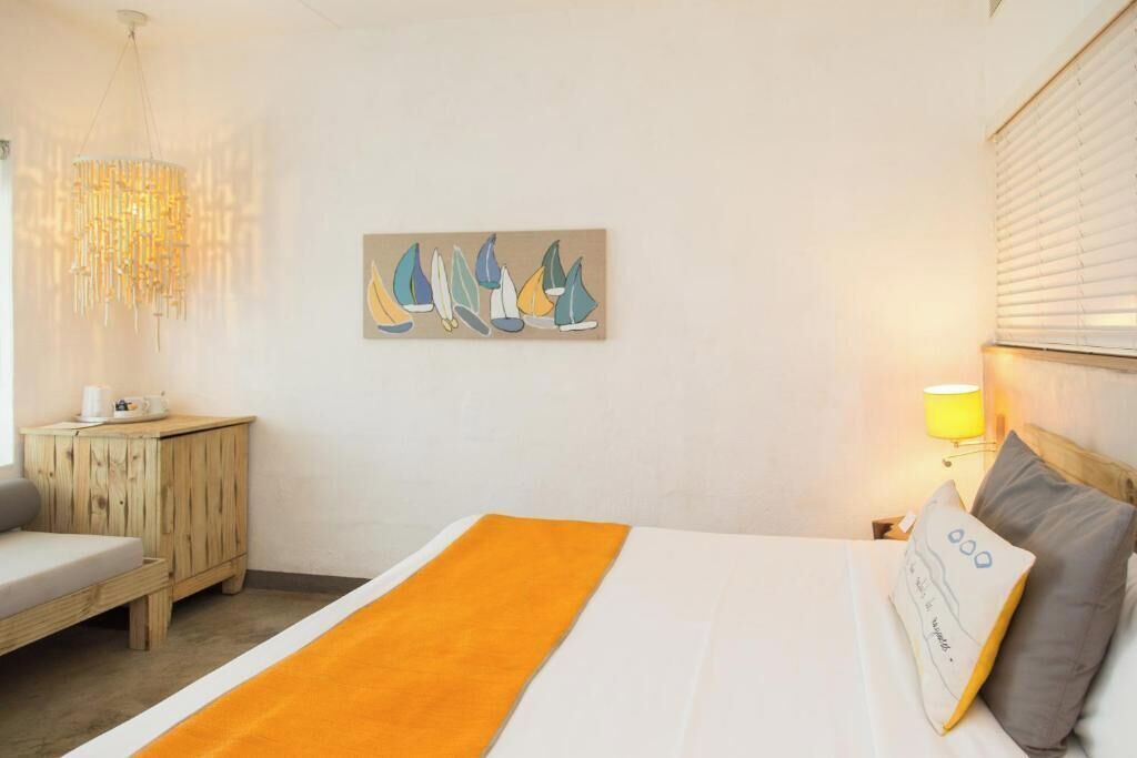 Free minibar items, in-room safe, blackout curtains, iron/ironing board