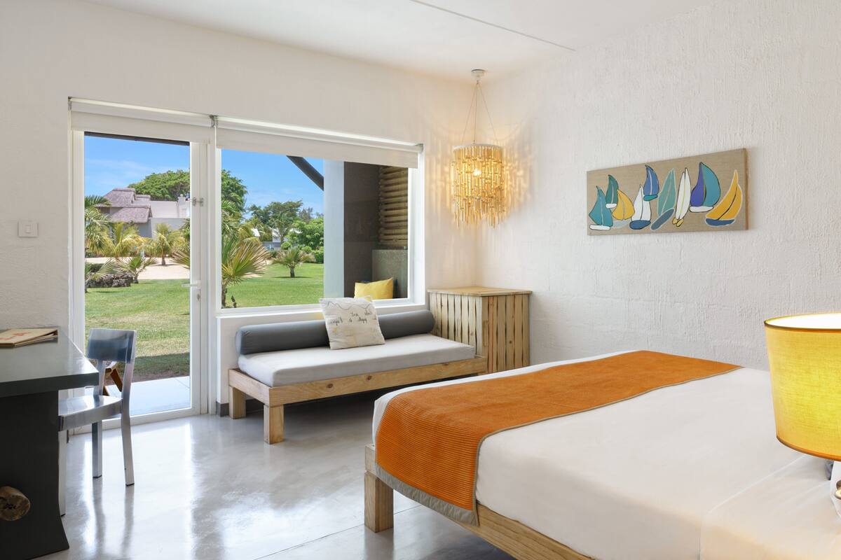 Free minibar items, in-room safe, blackout curtains, iron/ironing board