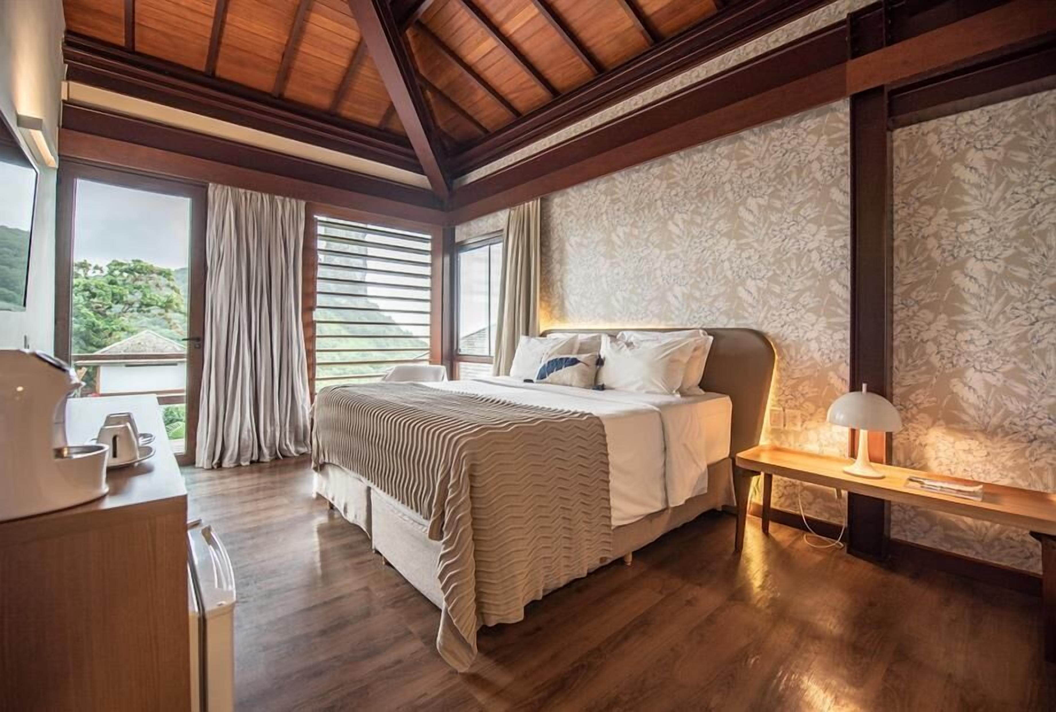 Habitación Deluxe, 2 habitaciones, aire acondicionado | Ropa de cama de alta calidad y minibar 