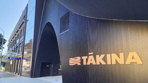 A modern building with a curved facade and the name "TAKINA" prominently displayed. - U Residence Hotel, Signature Collection by BW (Wellington)