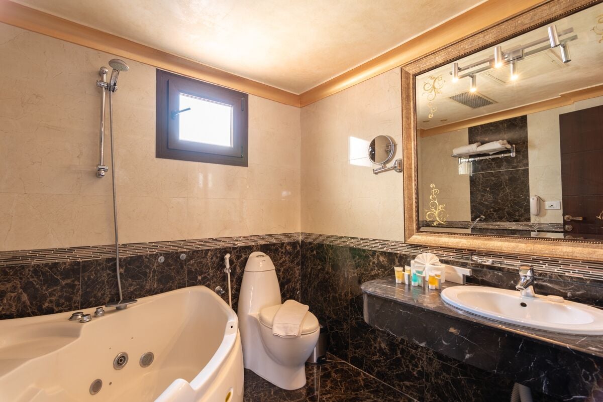 royal double room | bathroom | combined shower/bathtub, designer toiletries, hair dryer, bidet