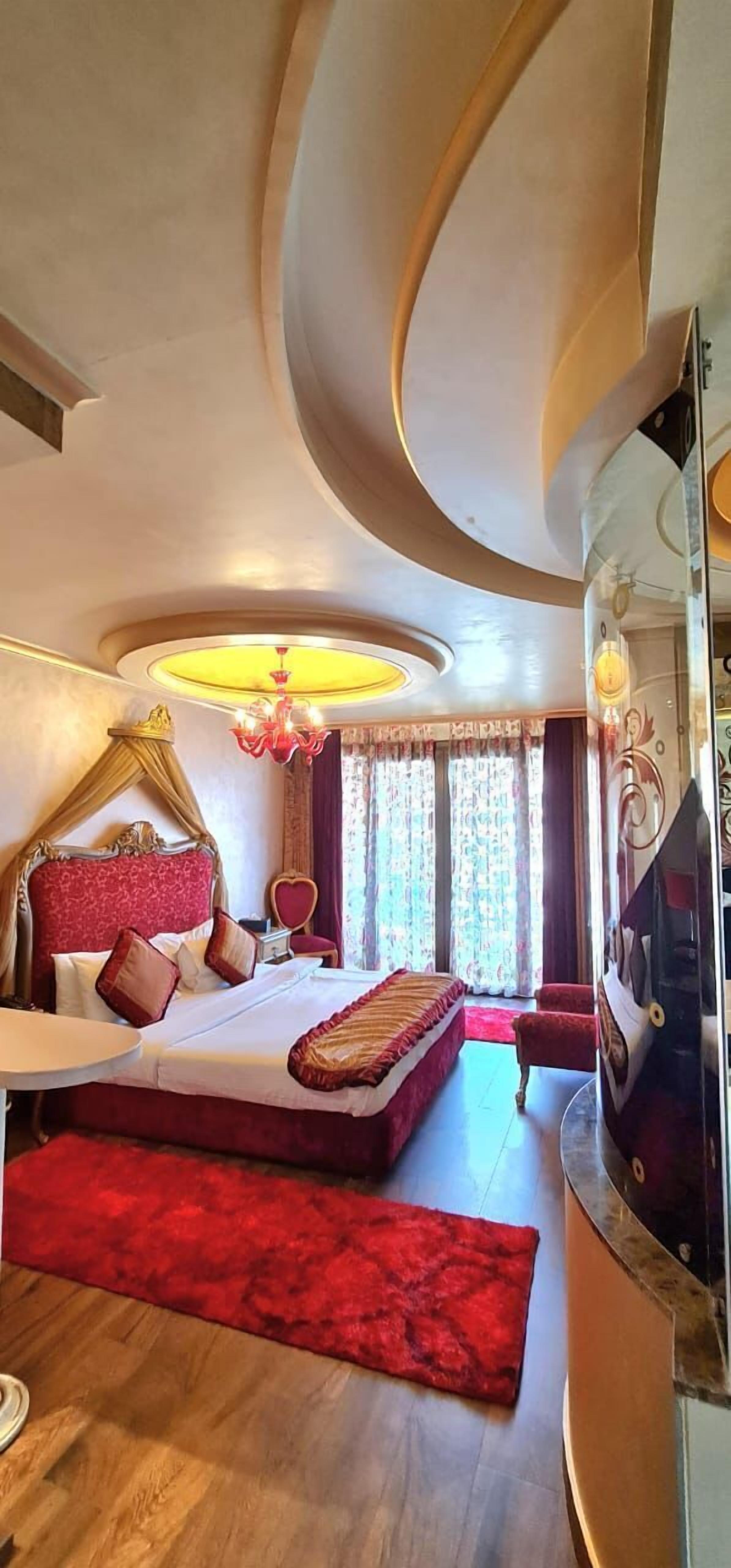 honeymoon room, 1 king bed | living area | lcd tv