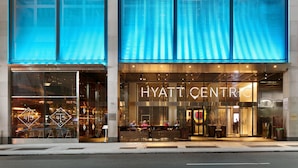 The exterior of a hotel with large glass windows, a prominent entrance, and a sign reading 'HYATT CENTRE.' - Hyatt Centric Times Square New York (New York)