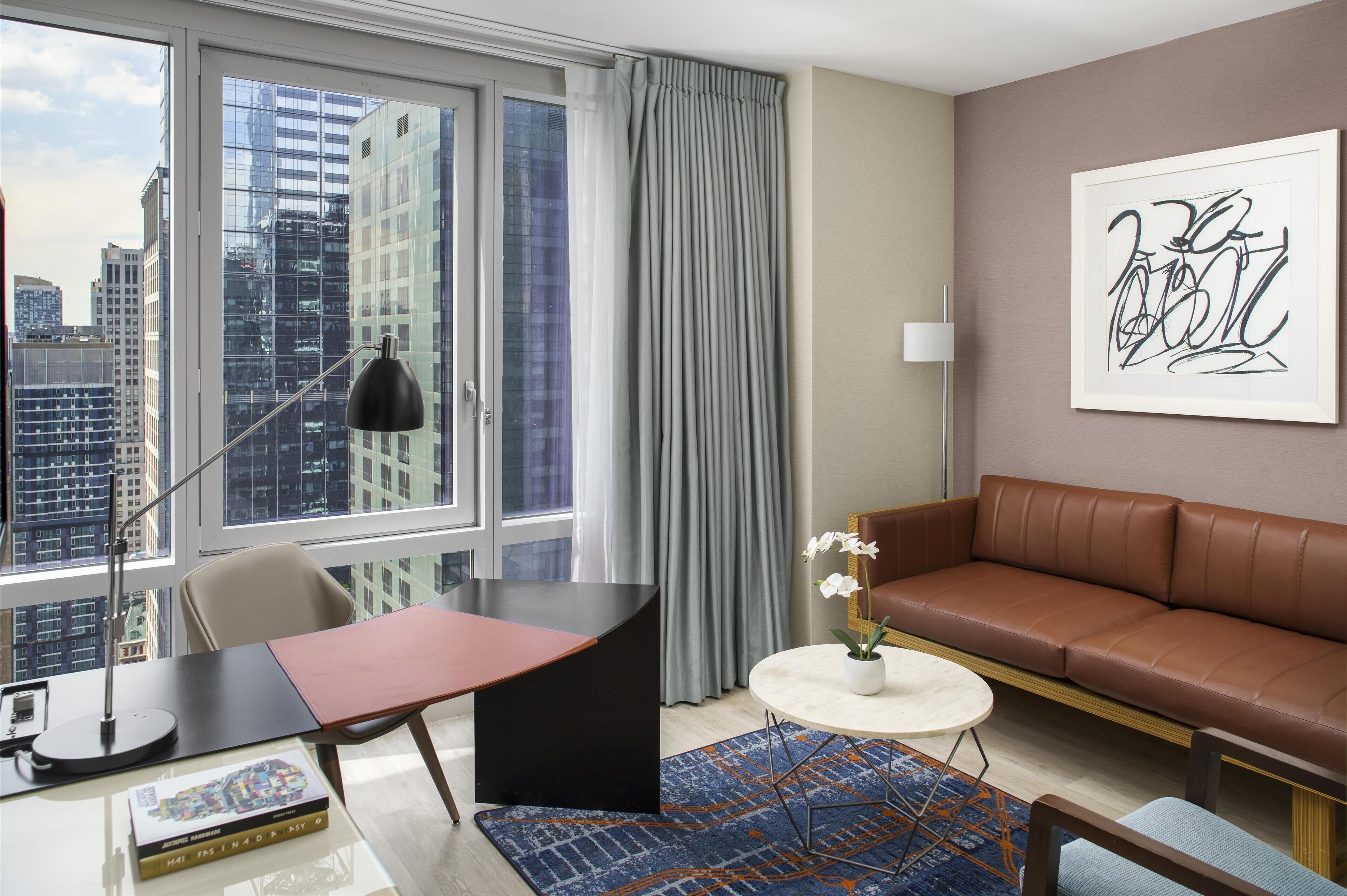 deluxe suite, 1 king bed | 1 bedroom, in-room safe, desk, laptop workspace