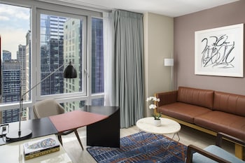 Deluxe Suite, 1 King Bed | In-room safe, desk, laptop workspace, blackout drapes at Hyatt Centric Times Square New York