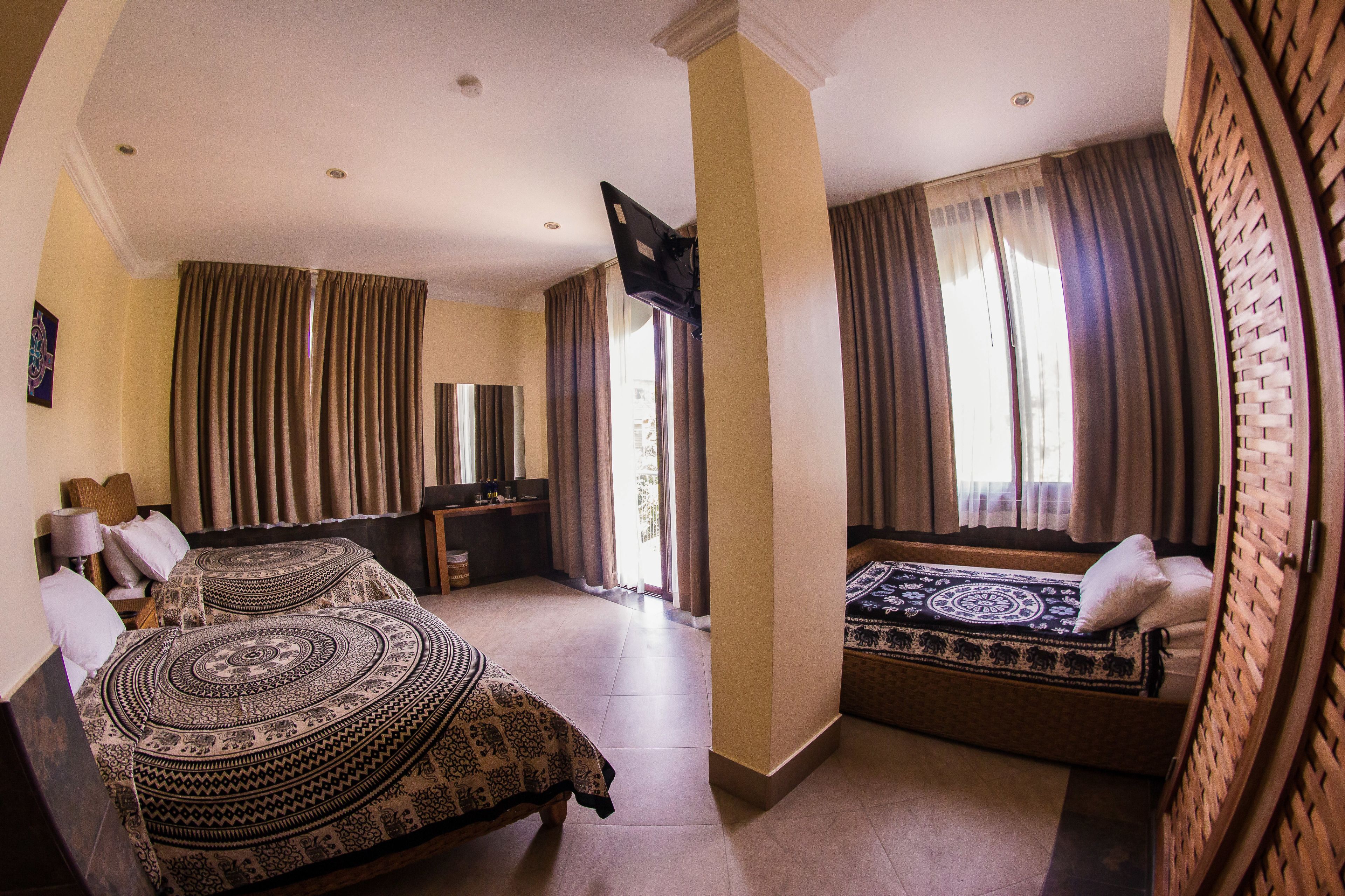 family room | down duvets, in-room safe, individually decorated, desk