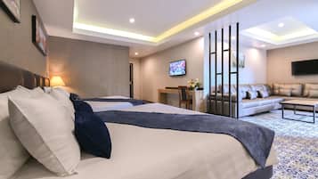Family Suite Room | 1 chambre, minibar, coffres-forts dans les chambres, rideaux occultants