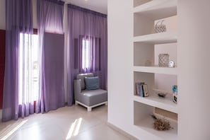 Suite Junior | Coffres-forts dans les chambres, rideaux occultants