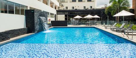 Outdoor pool, open 10:00 AM to 7:00 PM, sun loungers