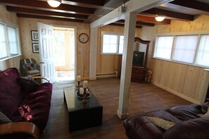 Beach1 Roost, 3 Bedrooms, 4 Double Beds with Sofabed, Kitchen | Living area | Flat-screen TV - Riverview Cottages (Wasaga Beach)
