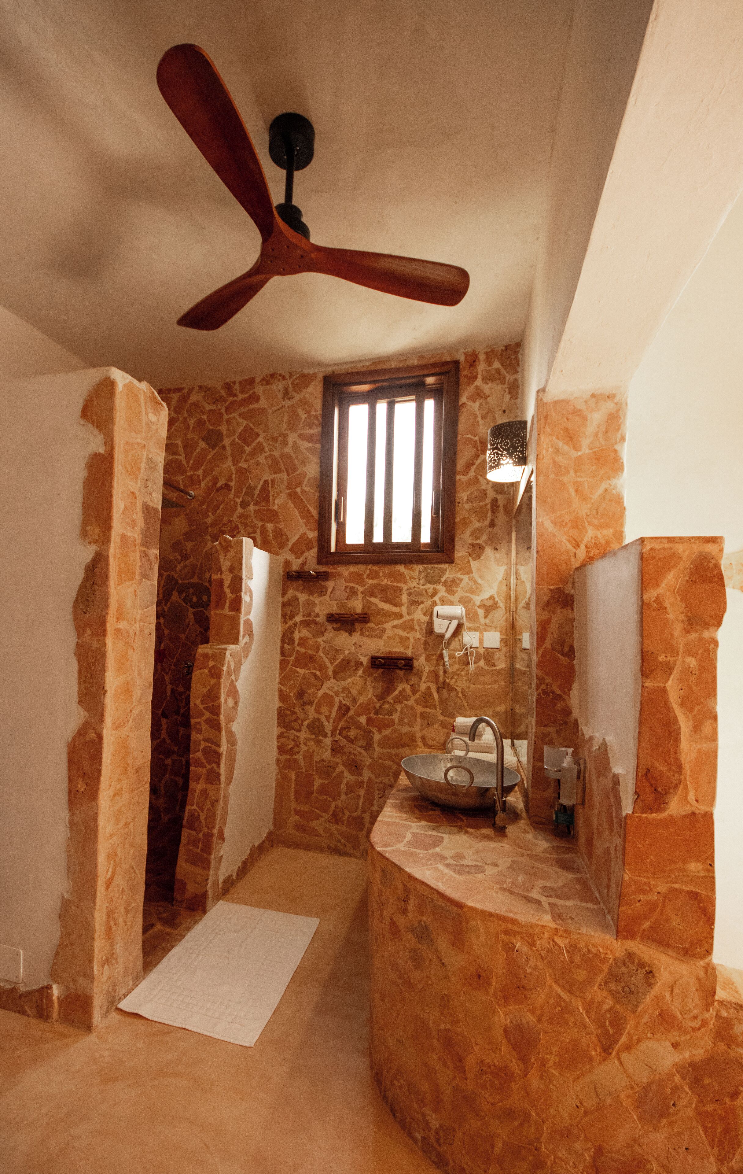 shower, rainfall showerhead, hair dryer, towels