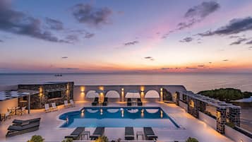 Seasonal outdoor pool, pool umbrellas, pool loungers