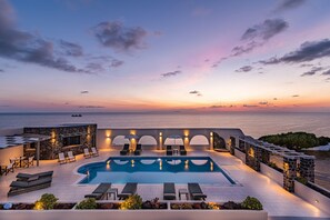 Seasonal outdoor pool, pool umbrellas, sun loungers