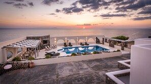 Seasonal outdoor pool, pool umbrellas, sun loungers