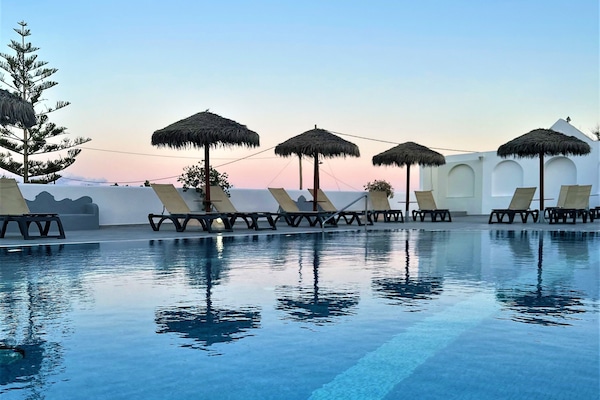 Seasonal outdoor pool, sun loungers