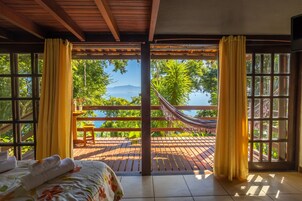 Cabaña familiar | Minibar y ropa de cama